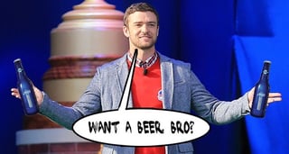 Justin Timberlake holding beers in each hand