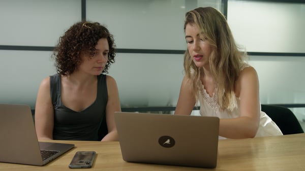 women looking at computer