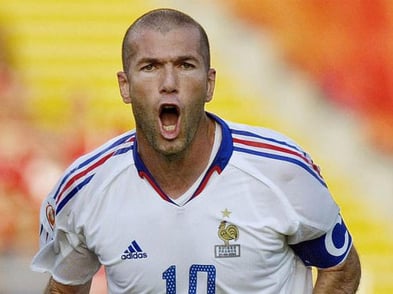 Zinedine Zidane in French soccer team uniform screaming