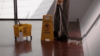 janitor mopping a floor GIF