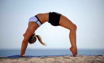 flexible woman doing yoga