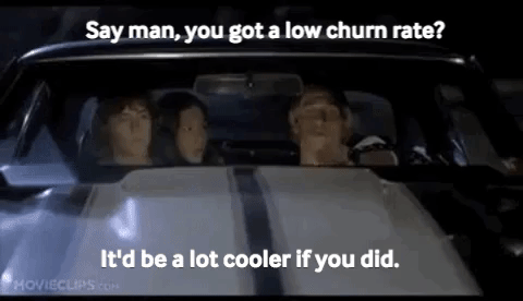 gif three people in a car talking about low churn rate