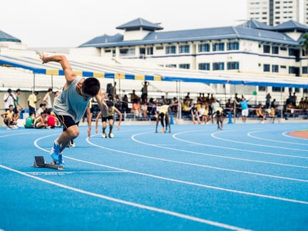 man starting to run a race