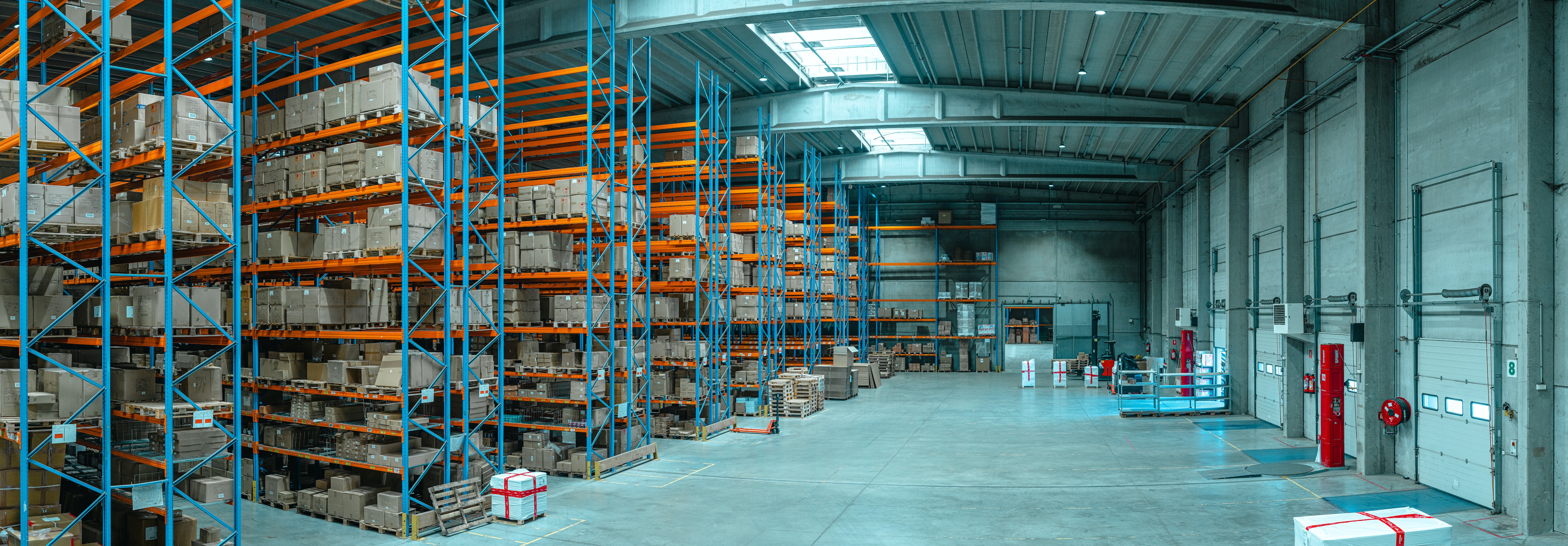 wide angle shot of a warehouse showing potential use cases for generative ai in supply chain