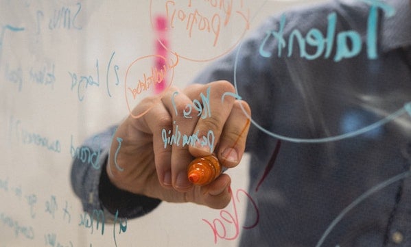 writing on a whiteboard