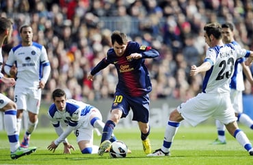 Lionel Messi dribbling on soccer field stadium 