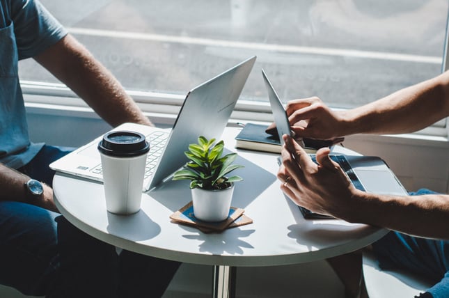 two people working on their computers