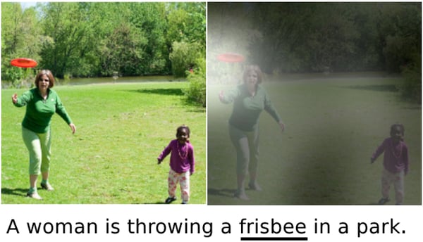 woman throwing frisbee in the park