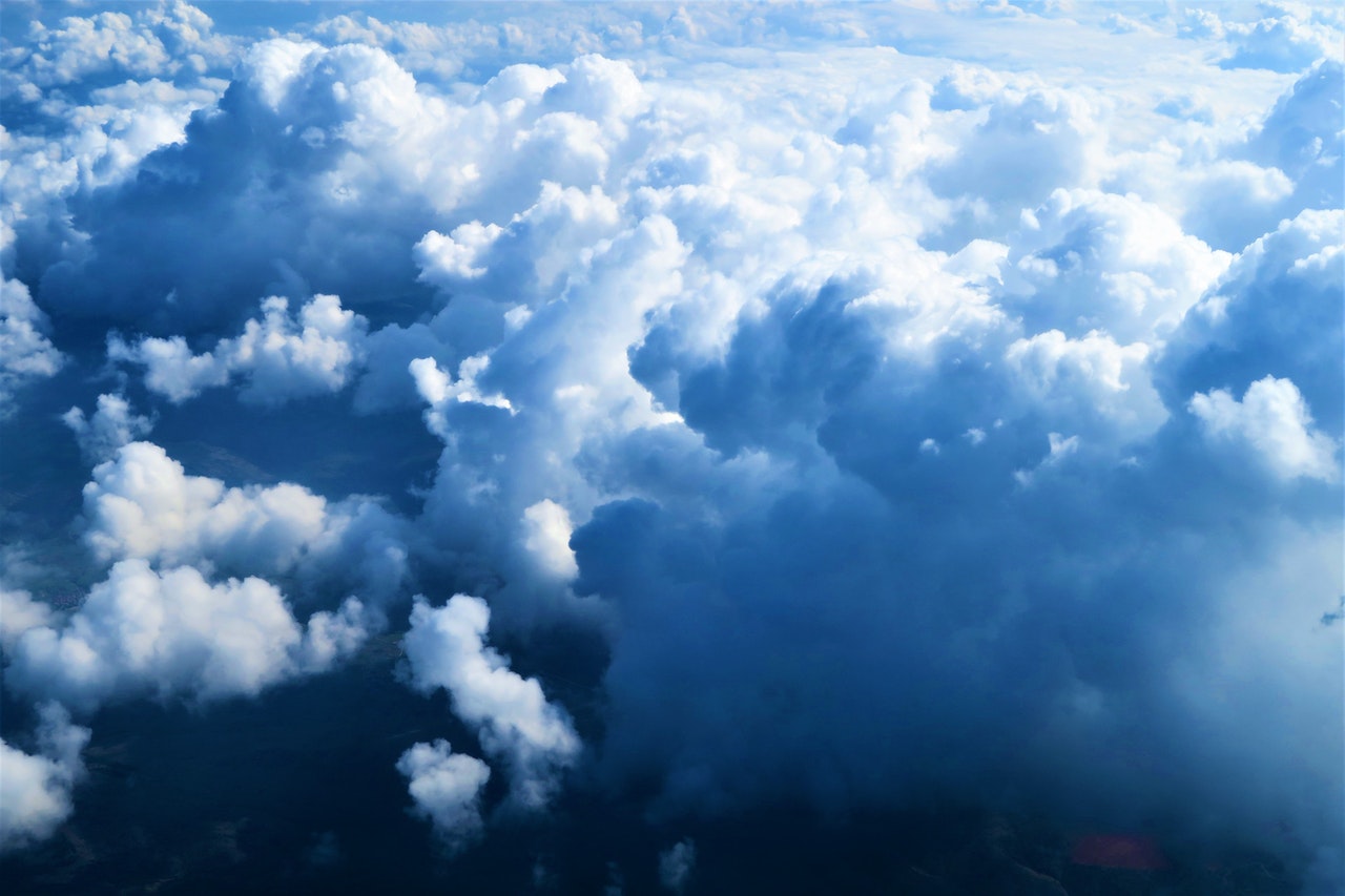 blue and white clouds seen from a bird eye's view
