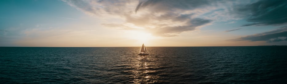 sailboat-drifting-on-open-water