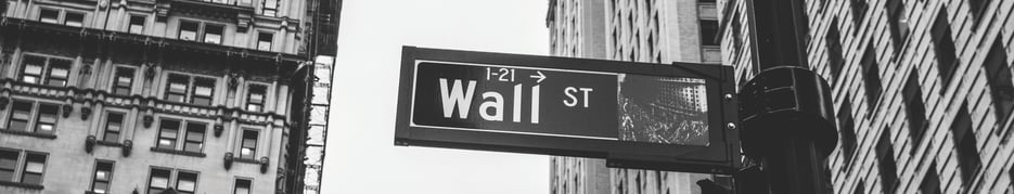 wall street black and white sign