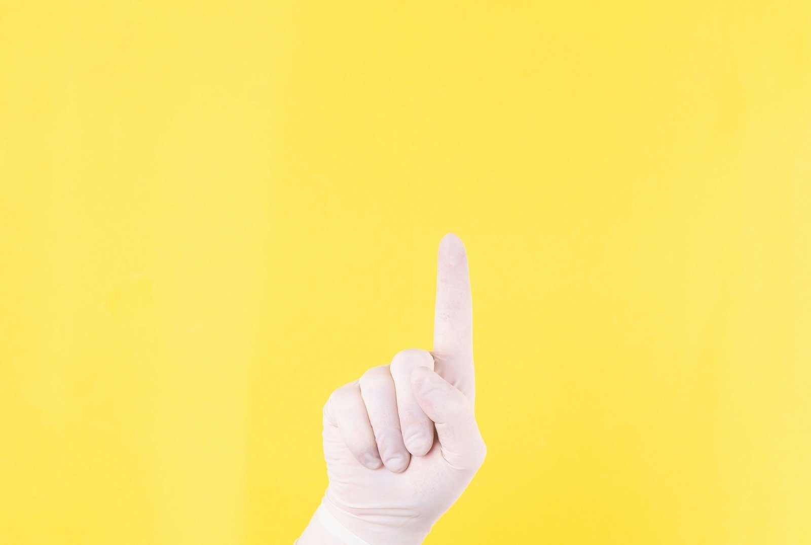 level up, finger pointing up with yellow background
