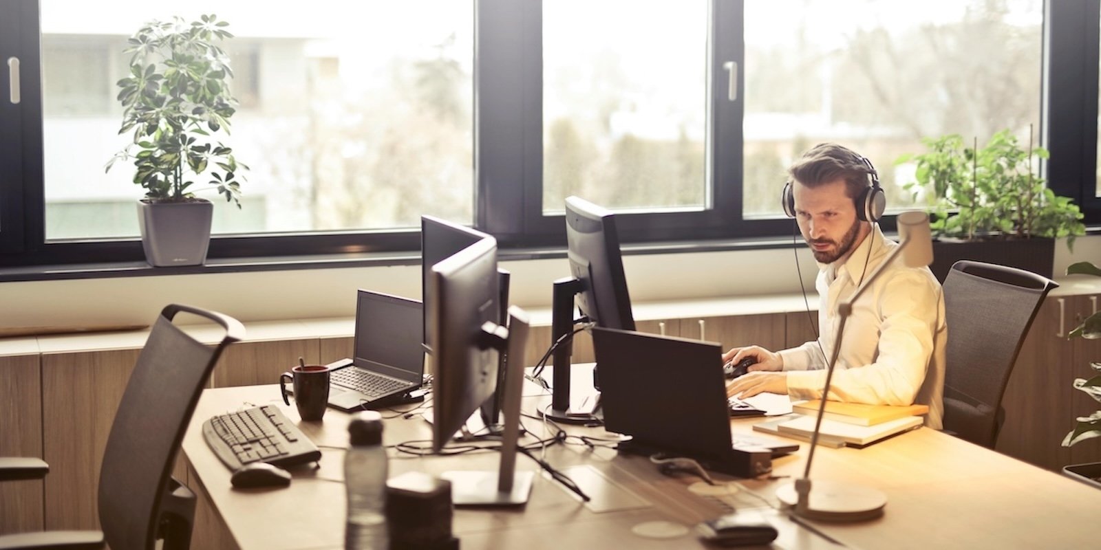 man at his desk for AML